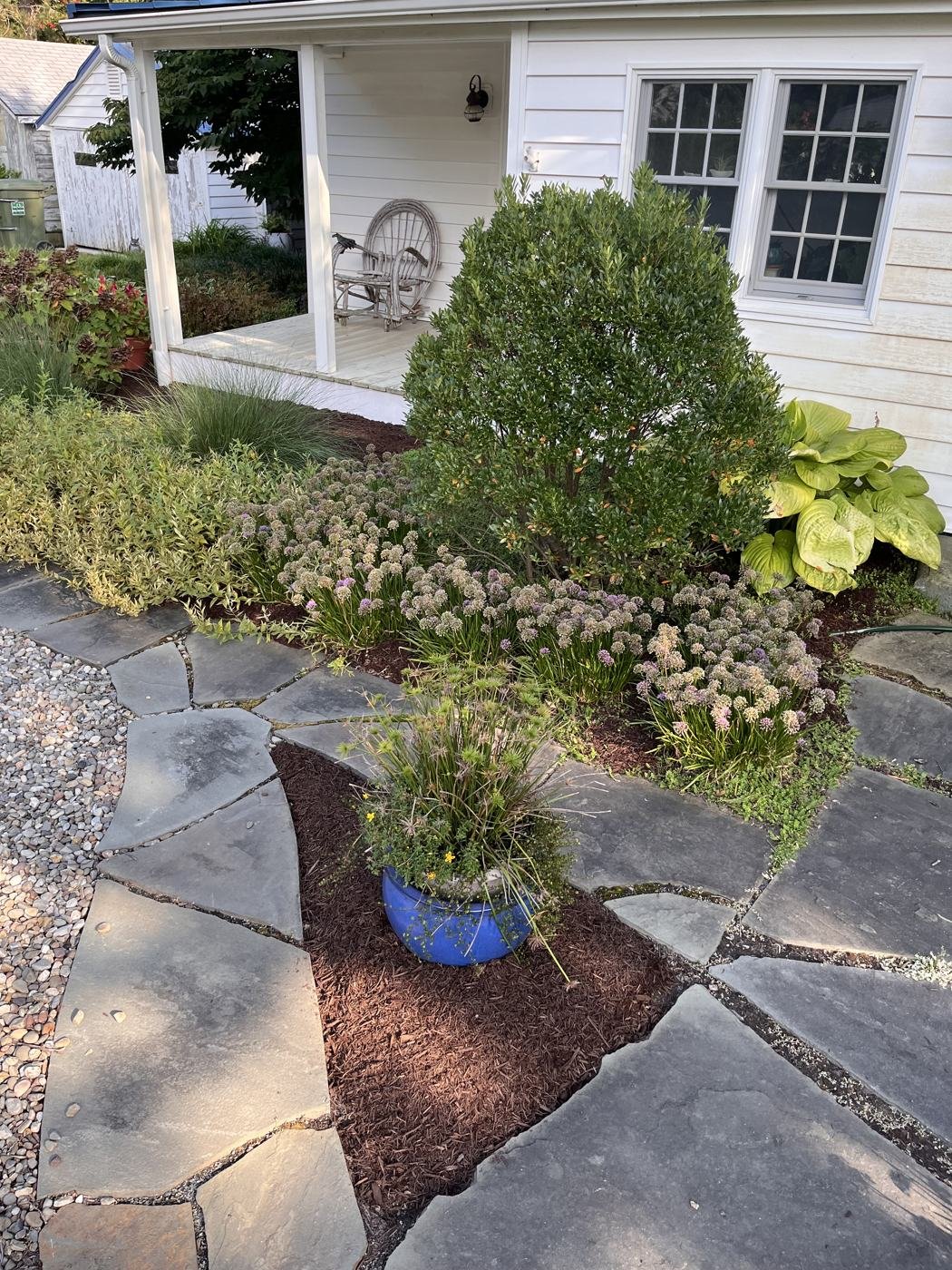 Close-up of a mulched bed by the front porch